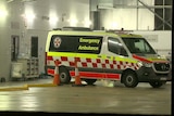 An ambulance outside a hospital bay