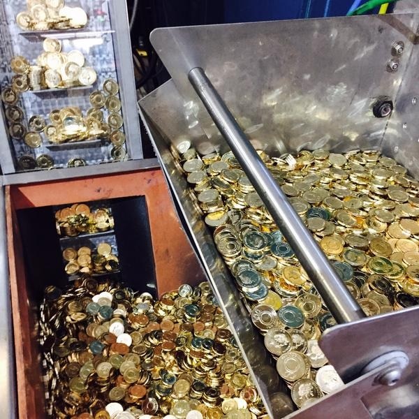 Coins being struck at the Royal Australian Mint