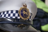 Close up of a Tasmania Police cap.
