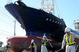 Symbolic Japanese shipping boat washed ashore in tsunami to be scrapped