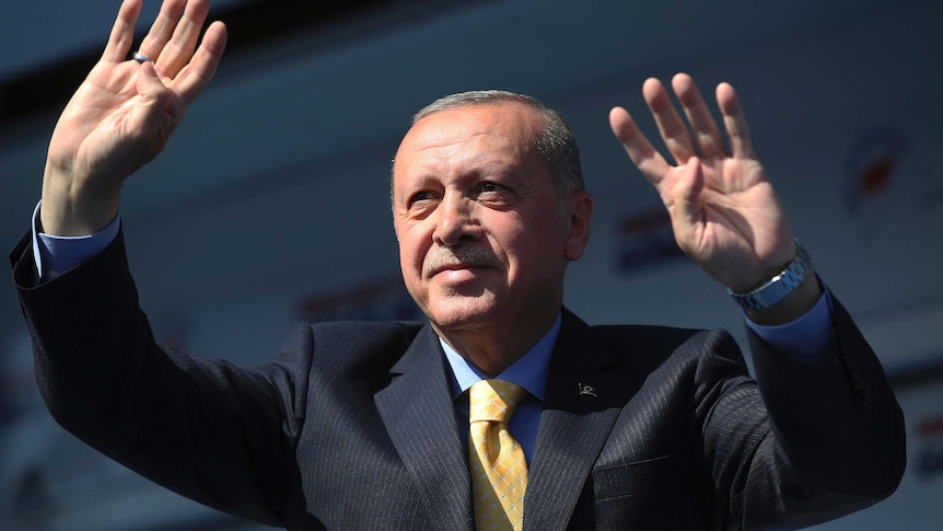 Recep Tayyip Erdogan salutes to supporters at a rally in Konya, Turkey
