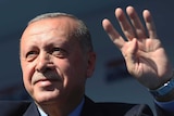 Recep Tayyip Erdogan salutes to supporters at a rally in Konya, Turkey
