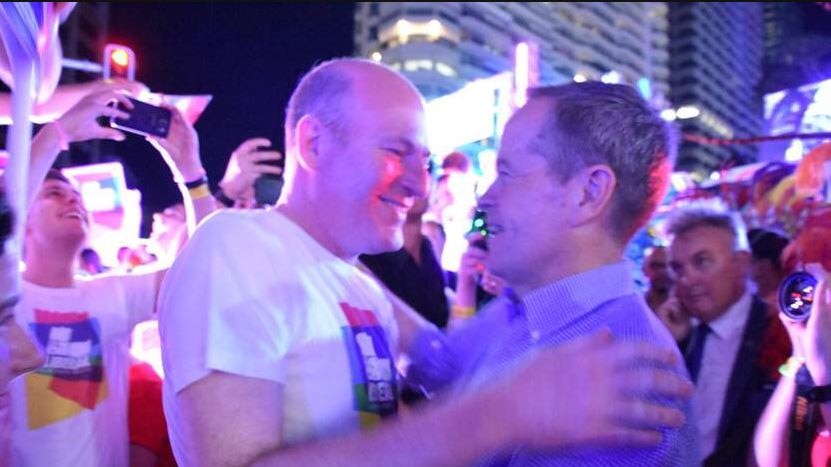 Liberal MP Trent Zimmerman embraces Opposition Leader Bill Shorten.