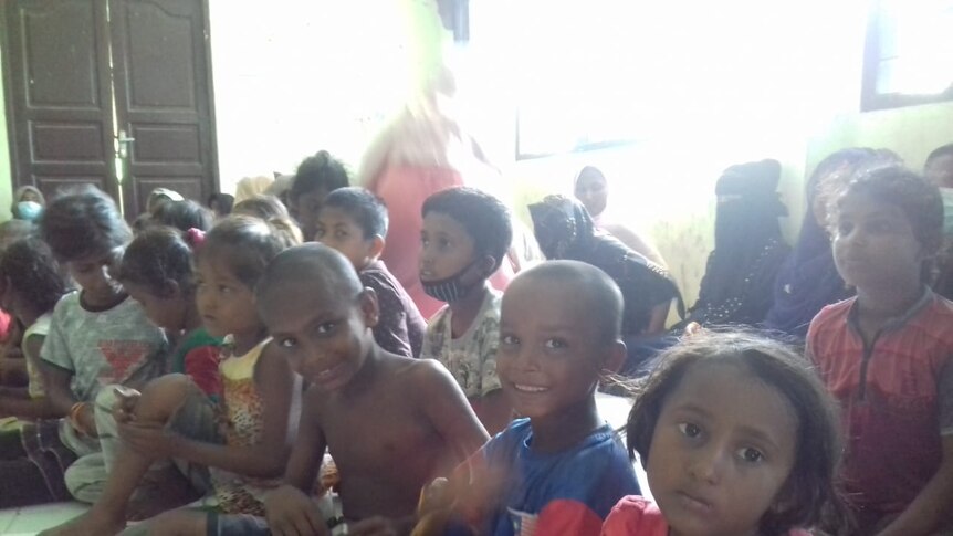 Rohingya children sit in an abandoned Indonesian immigration building in North Aceh, Indonesia.