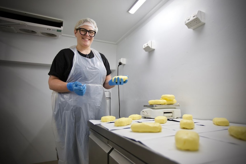 Olivia Morrison making butter.