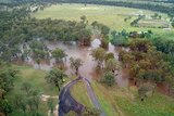 Floodwaters over the 3 Mile Bridge at Ashford, north-western NSW.