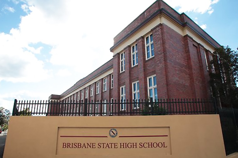 Exterior of original Brisbane State High building and school sign
