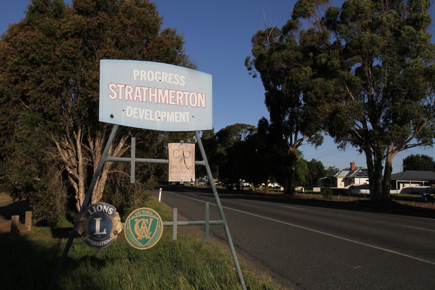 A township sign by the side of the road 