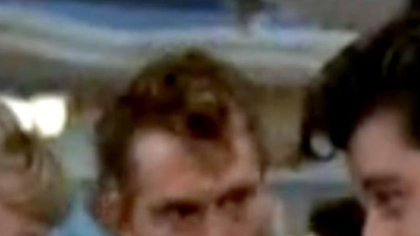 Jeff Conaway, centre, stars in a scene from the musical Grease