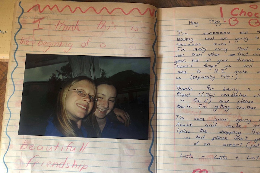 Page from a teenage scrapbook with 'I think this is the beginning of a beautiful friendship' written above a photo of two girls
