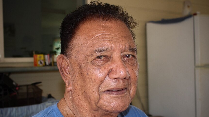 A headshot of Indigenous man William Busch looking at the camera