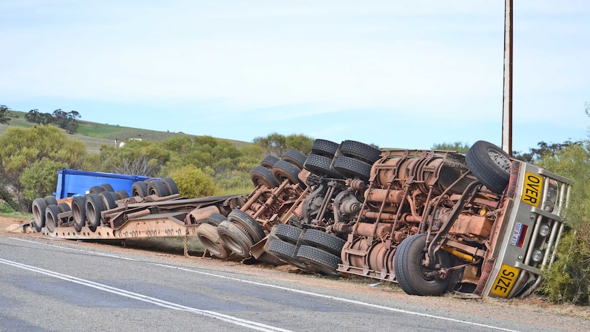 A truck has rolled on the Wilkins Highway near Crystal Brook in the mid-north of South Australia.
