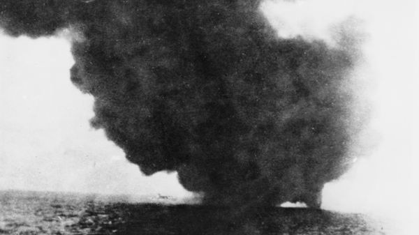 USS Peary on fire after the Japanese bombing of Darwin, 1942.