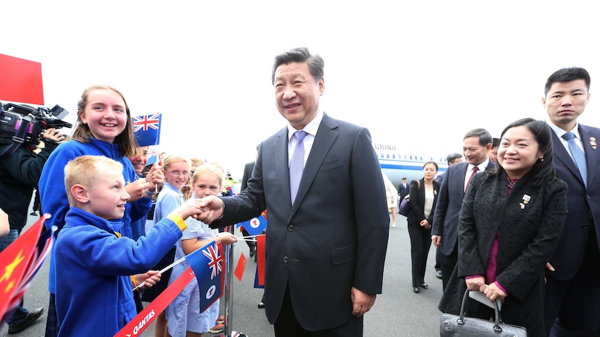 President Xi greeted by school children at Hobart International Airport