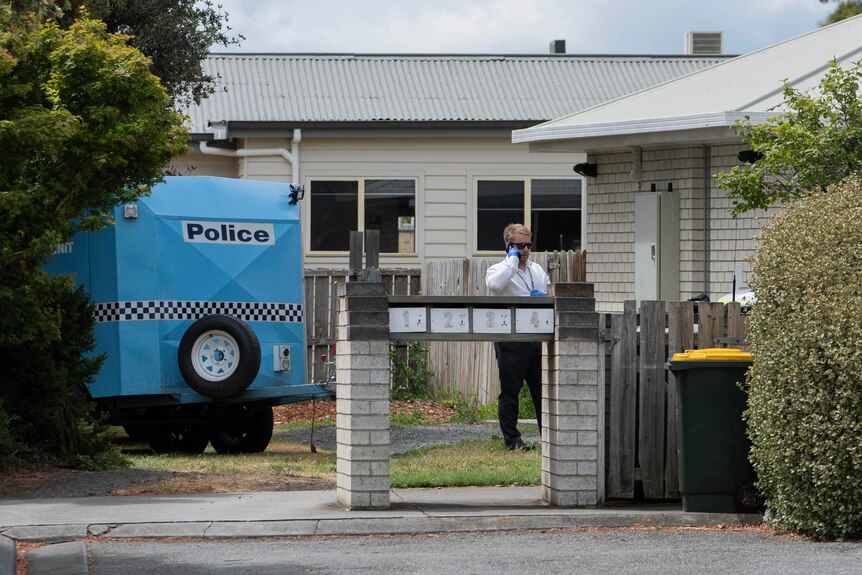 Tasmania Police detective at a crime scene in Sorell.