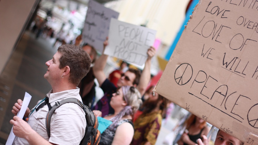 Rally demands end to corporate greed