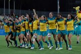 Australia's women's sevens team celebrate their gold medal win at the Rio Olympics