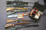 Guns and ammunition seized during raids on the NSW mid north coast