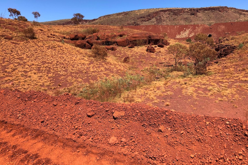 Red, rocky hills in the Australian desert.