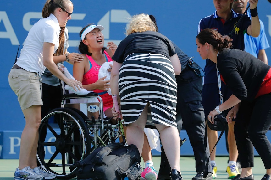 Peng wheeled off after cramping in US Open semi