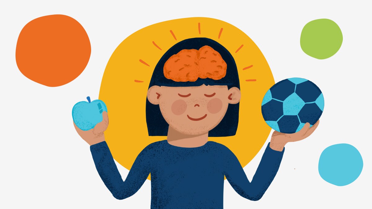 Woman holding an apple in one hand and a soccer ball in the other