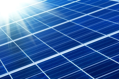 Solar panel with sunbeams. (Thinkstock: iStockphoto)
