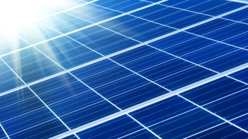 Solar panel with sunbeams. (Thinkstock: iStockphoto)