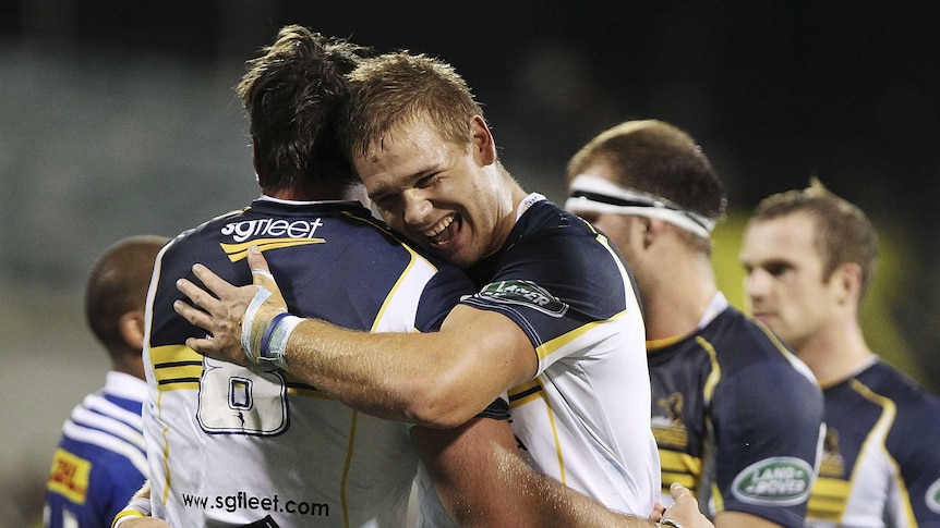 Winners are grinners ... Jack Whetton (R) celebrates with Brumbies captain Ben Mowen