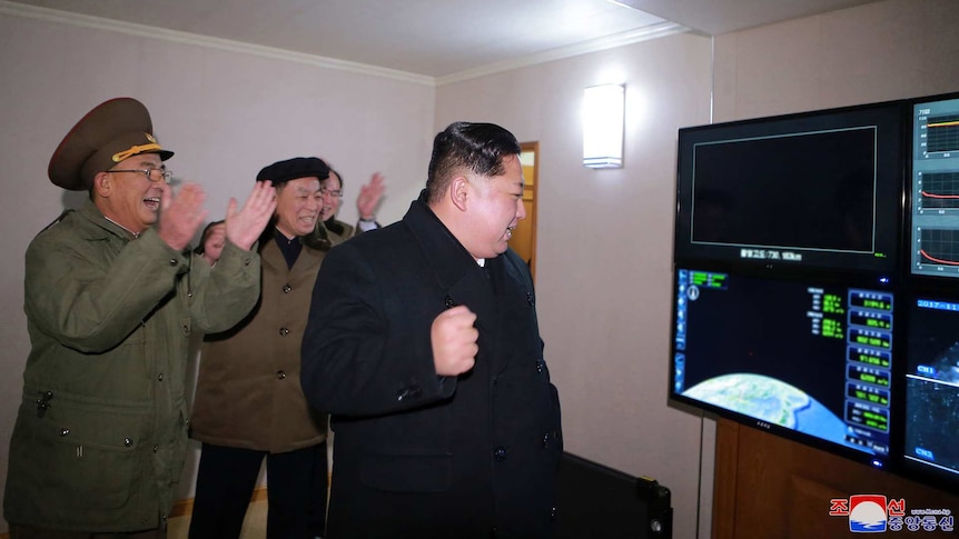 North Korean leader Kim Jong-un says its weapons programs are a necessary defence against US plans to invade (Image: AP/Korean Central News Agency)