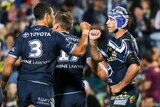 Johnathan Thurston and Justin O'Neill celebrate a North Queensland Cowboys try.