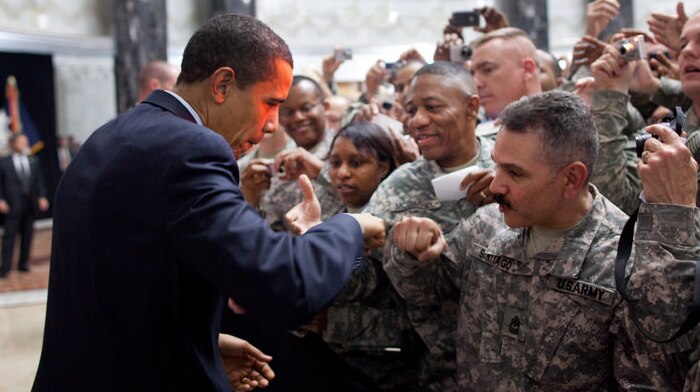 President Obama fist bumps a US soldier in Baghdad