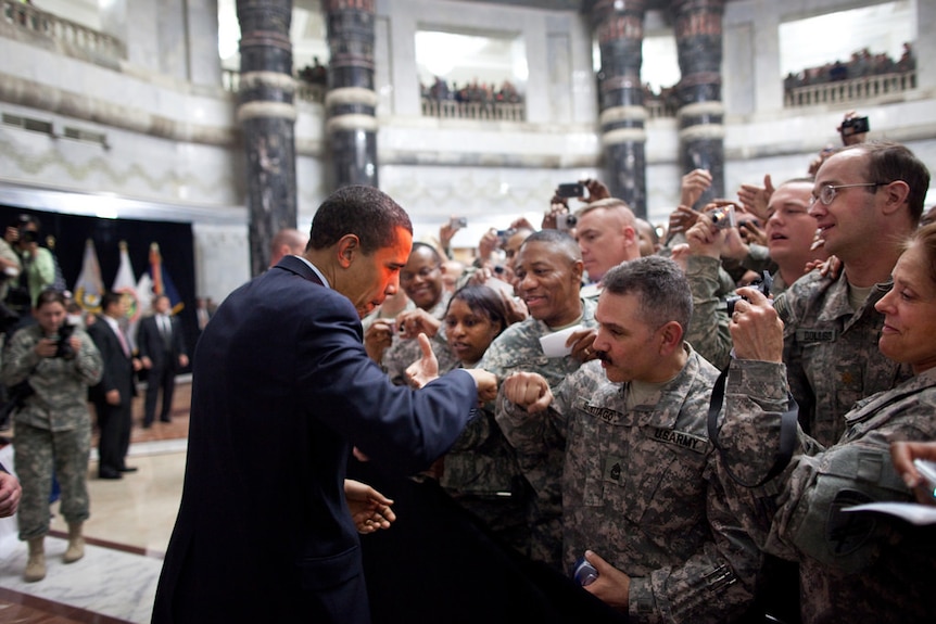 President Obama fist bumps a US soldier in Baghdad