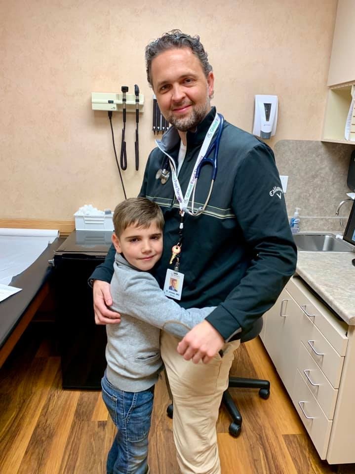 Isaac Allen with Doctor Douglas Jones at the Utah clinic.