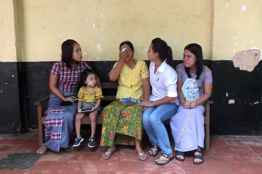 Relatives of detained Reuters journalists Wa Lone and Kyaw Soe Oo wait for their verdict