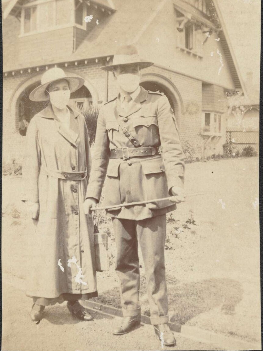 John Davidson and Christina Norrie wearing face masks during the Spanish Flu pandemic, Killara, New South Wales, February 1919