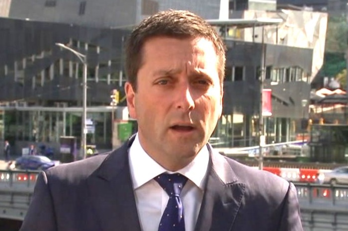 Matthew Guy addresses the media.