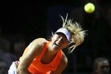 Maria Sharapova screams as she serves in Stuttgart