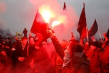People attend a rally in Bolotnaya square in Moscow to protest against alleged election fraud.