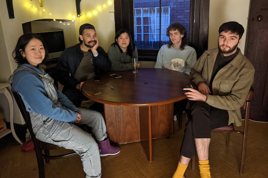 Ann Ding (centre) and her four housemates at their Ashfield share house. 