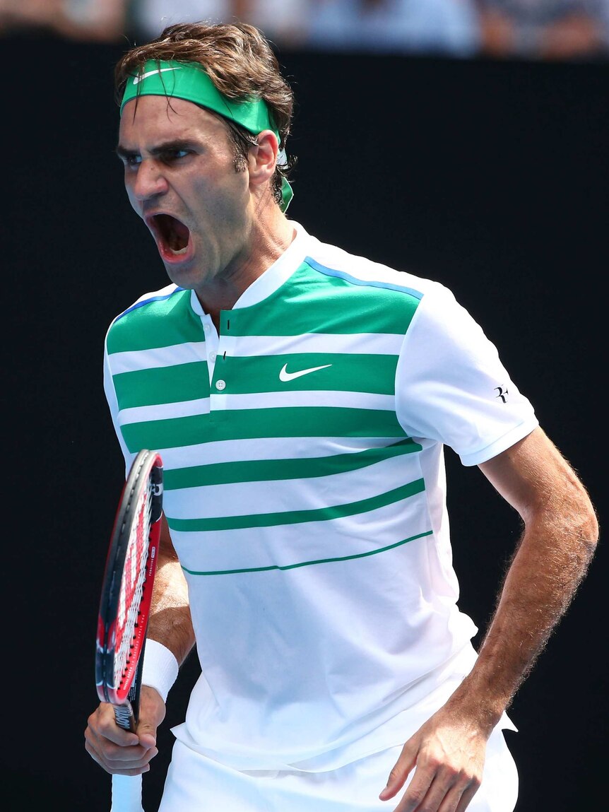 Clinical display ... Roger Federer celebrates winning a point in his quarter-final match against Tomas Berdych
