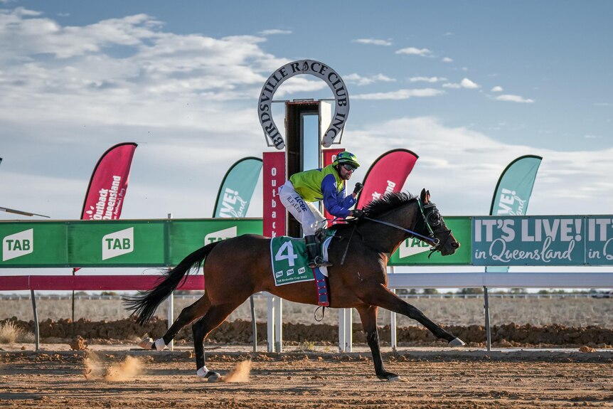 Horse crosses the line at Birdsville Race Track