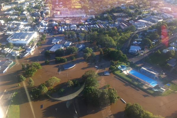 A CareFlight helicopter provides an aerial view of Gympie after Cyclone Marcia