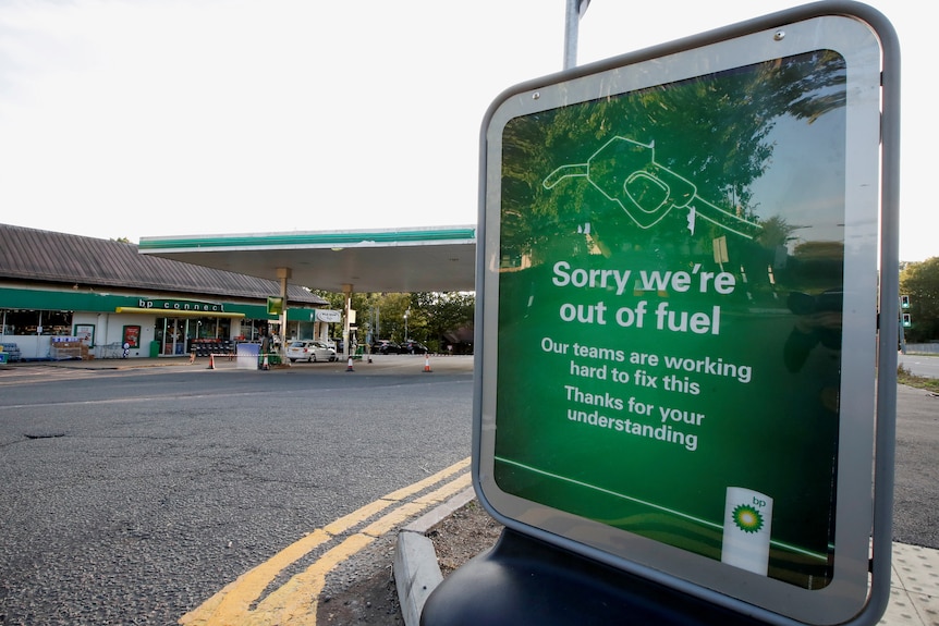A BP petrol station displays a sign indicating that it has run out of fuel