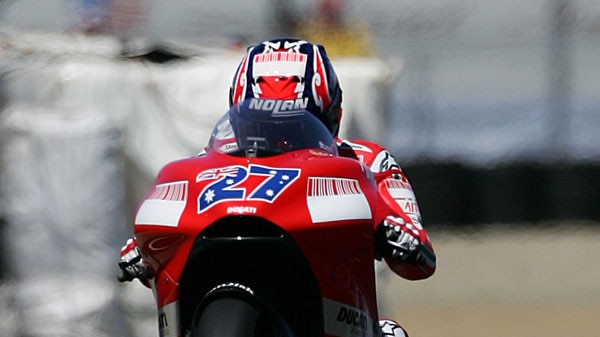 Another triumph ... Casey Stoner celebrates his win at the US MotoGp