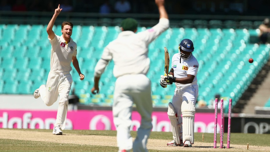 First scalp ... Rangana Herath was first wicket to fall on day four, bowled by Jackson Bird.