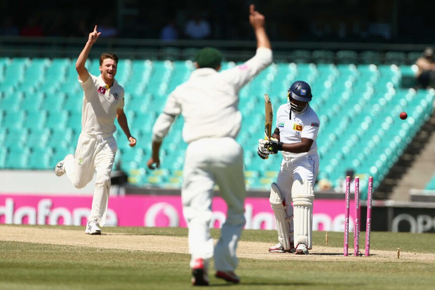 First scalp ... Rangana Herath was first wicket to fall on day four, bowled by Jackson Bird.