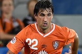 Thomas Broich and Zhang Chengdong battle for possession