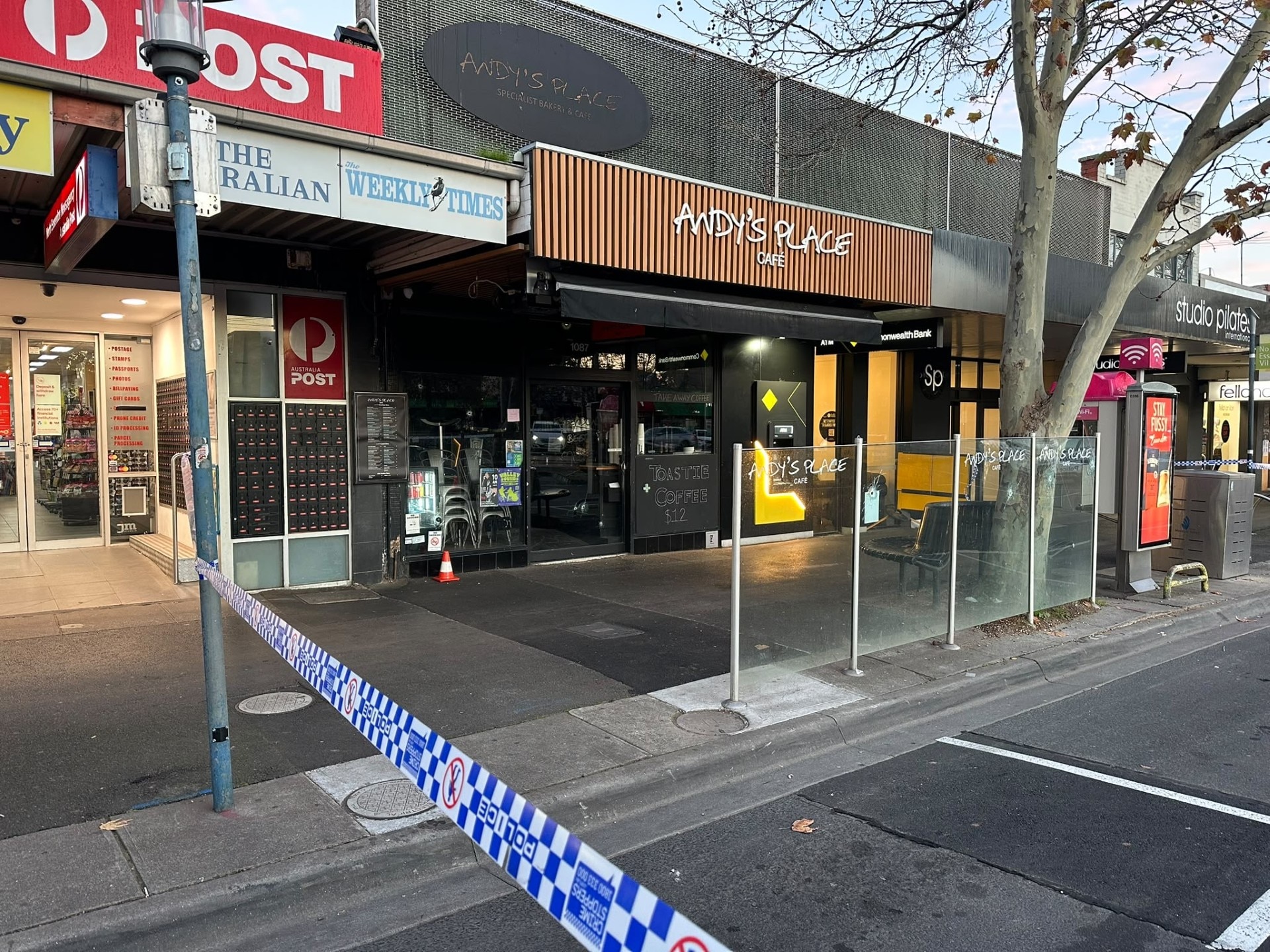 Two men arrested after Melbourne cafe shooting