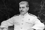 Former Russian leader Josef Stalin sits in a chair