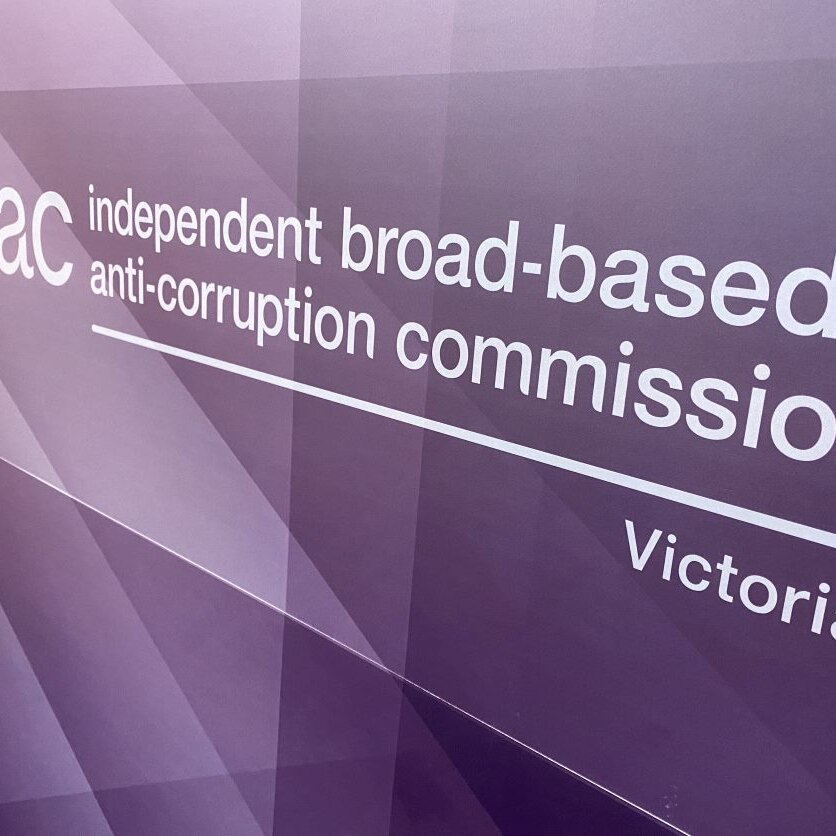 Close-up of signage spelling out the full IBAC name - Independent Broad-based Anti-corruption Commission.